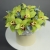 Композиция в шляпной коробке из 11 лаймовых орхидей в Котельниках Композиция в шляпной коробке из 11 лаймовых орхидей в Котельниках